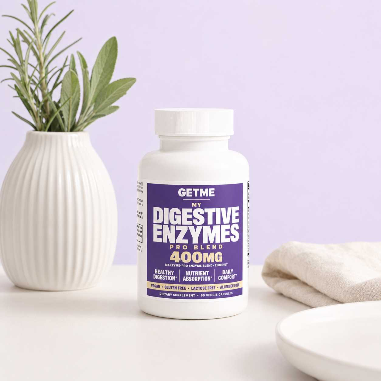 Getme Digestive Enzymes Pro Blend bottle on a light surface with herbs and linen