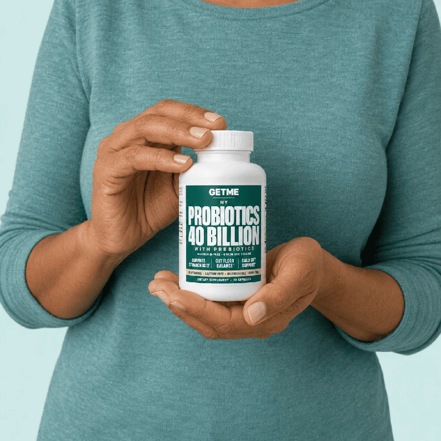 Woman holding a bottle of Getme Probiotics 40 Billion